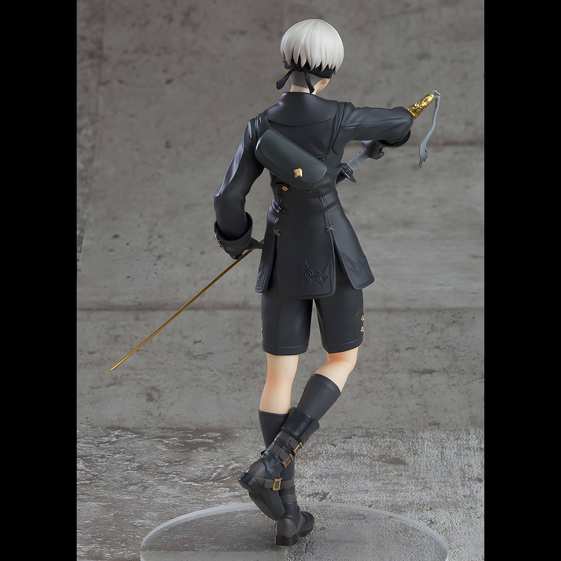 Back view of Good Smile Company NieR Automata Pop Up Parade 9S (YoRHa No.9 Type S) Figure in black outfit with a sword on a gray background