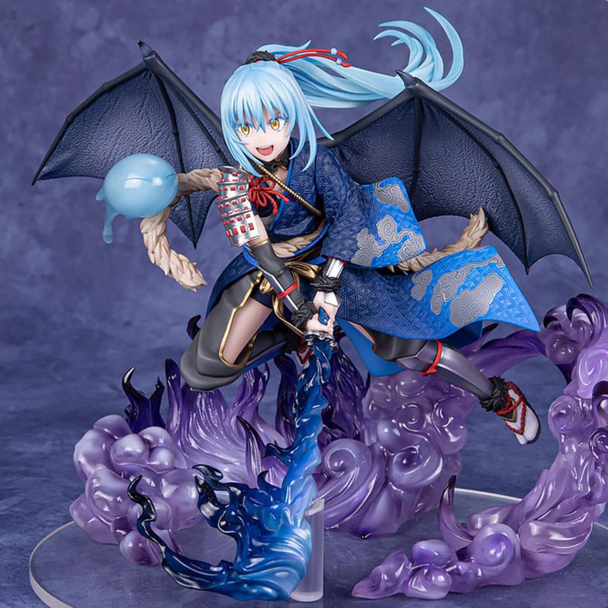 That Time I Got Reincarnated as a Slime Figurine of Rimuru Tempest with blue hair and dragon-like wings on a purple and blue background