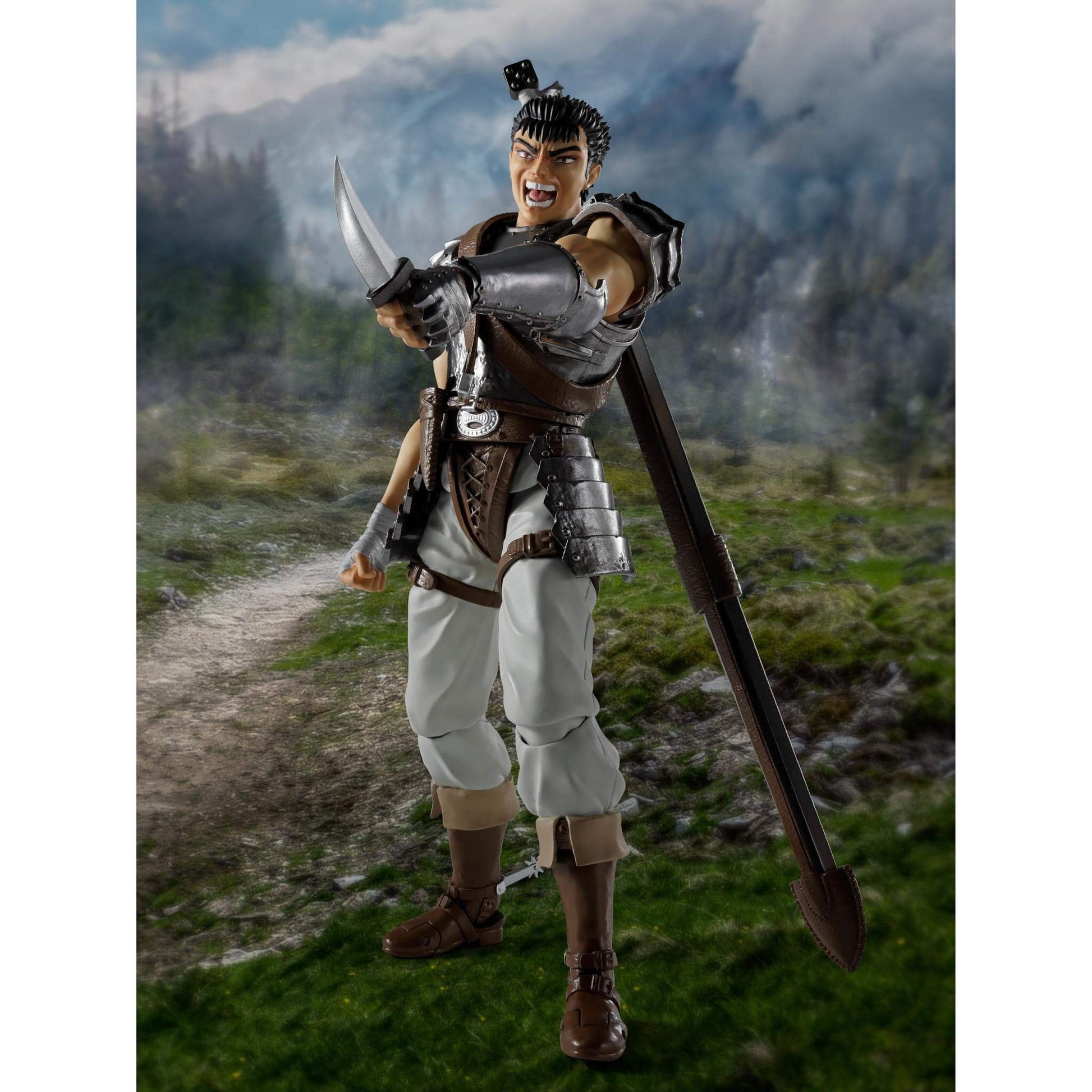 Berserk S.H.Figuarts Action figure of Guts in a scenic outdoor setting