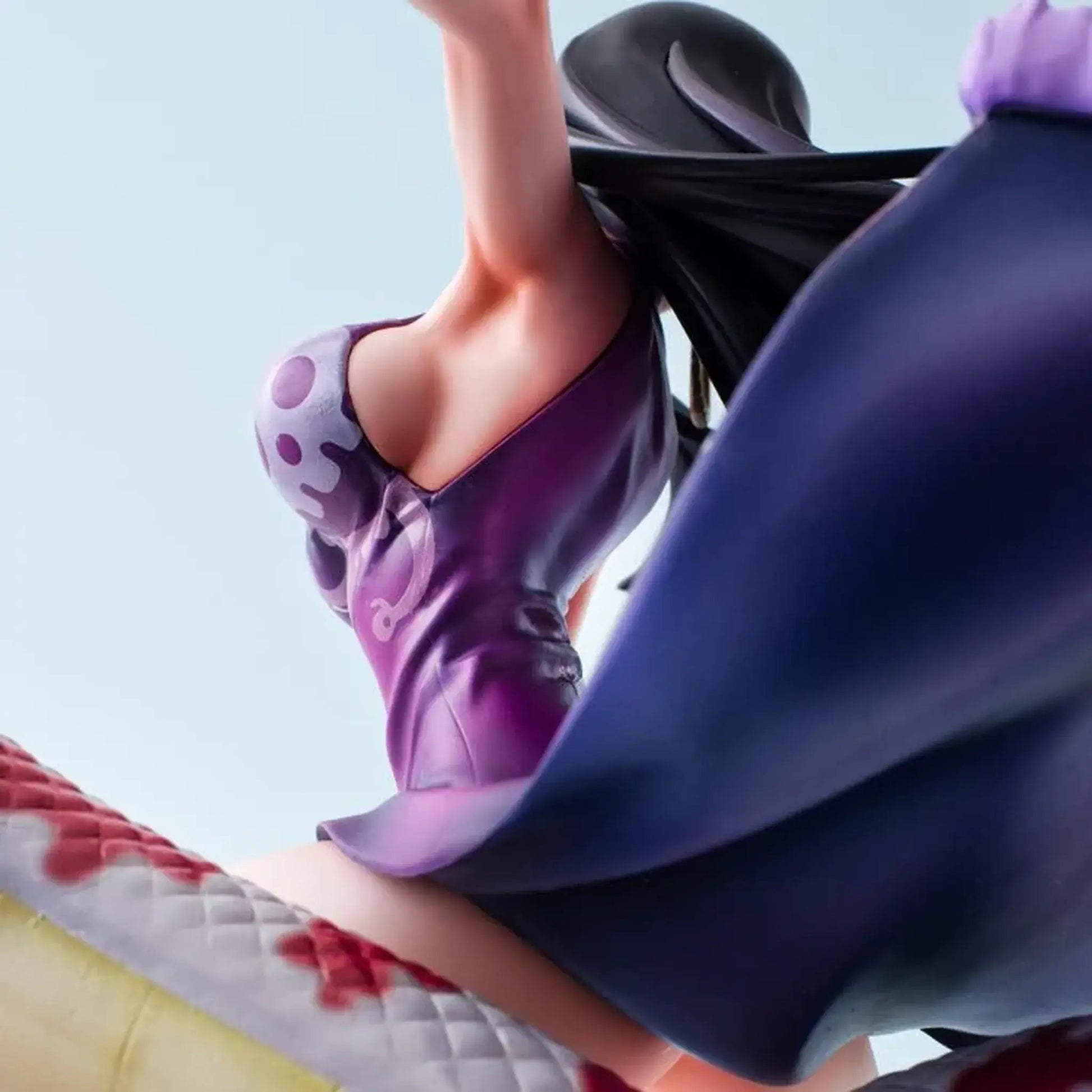 Close-up of One Piece Portrait of Pirates A-MAXIMUM Pirate Empress Boa Hancock statue from an anime or manga with purple shoes and dark hair against a light blue background.