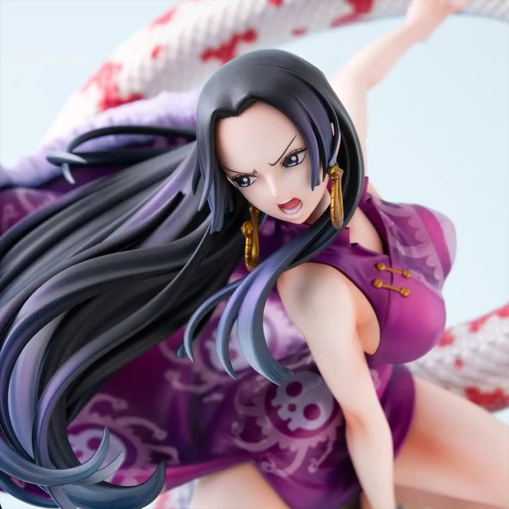 Close look of One Piece Portrait of Pirates A-MAXIMUM Pirate Empress Boa Hancock statue with long black and purple hair and a purple outfit.