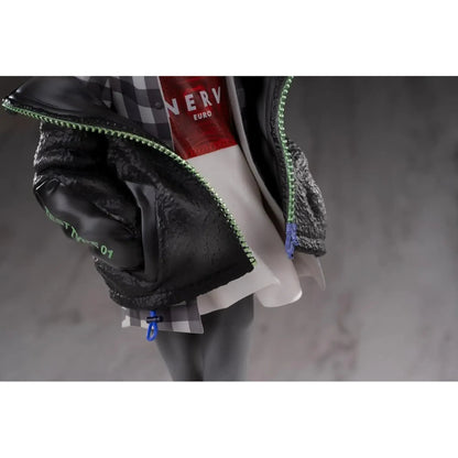 Close up view of Neon Genesis Evangelion 1/7 Scale Figure of Kaworu Nagisa wearing a black jacket with green zipper details on a neutral background