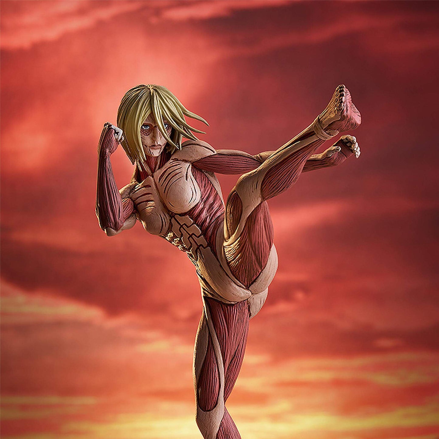 Attack On Titan Female Titan Pop Up Parade L sized figure, which features detailed muscular design, kicks up against a red sky