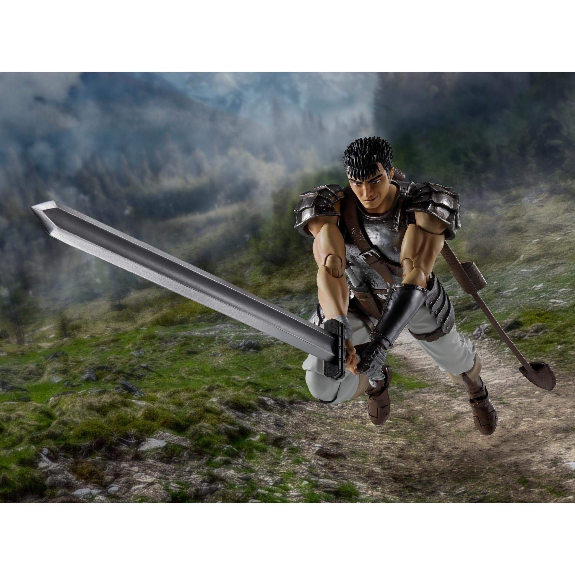 Berserk S.H.Figuarts Action figure of Guts with a sword and shield in a mountainous landscape
