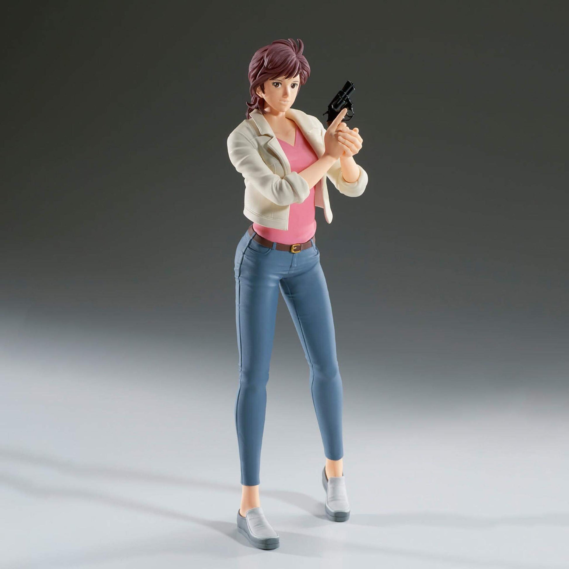 City Hunter anime figure of Kaori Makimura holding a gun on a gray background with depth