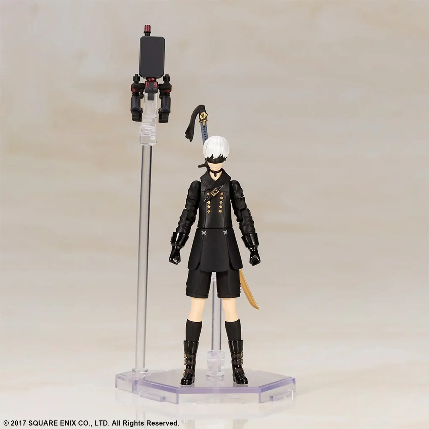 9S Action figure on a stand with his pod on a neutral background