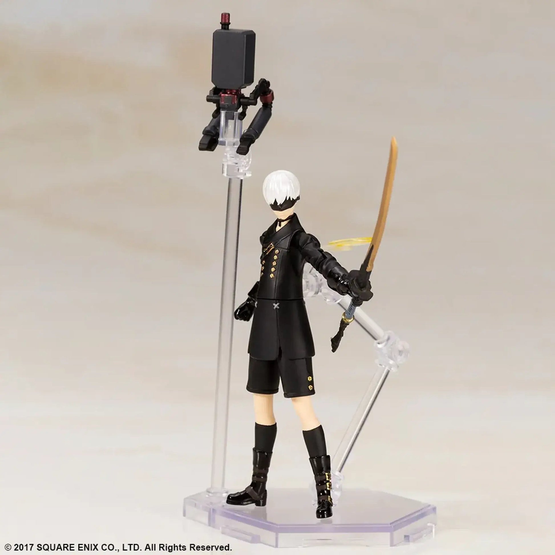 9S from the Nier Automata video game on a stand with a neutral background