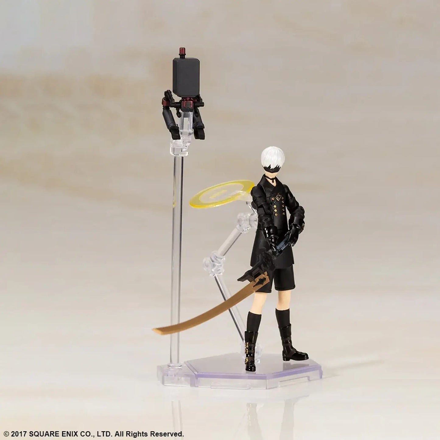 9S action figure from the Nier Automata video game on a stand with a neutral background