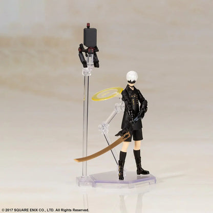9S action figure from the Nier Automata video game on a stand with a neutral background