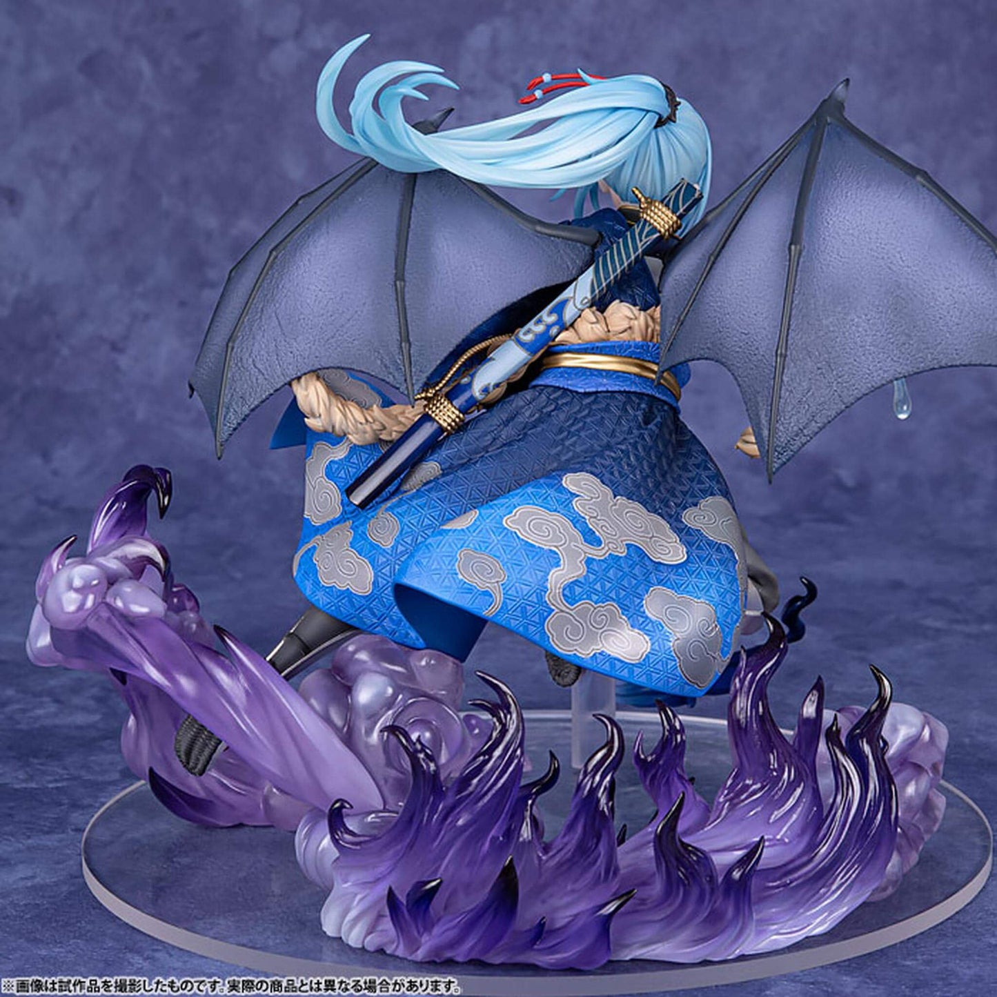 That Time I Got Reincarnated as a Slime Figurine of Rimuru Tempest  in blue attire with an umbrella and purple flames on a dark background