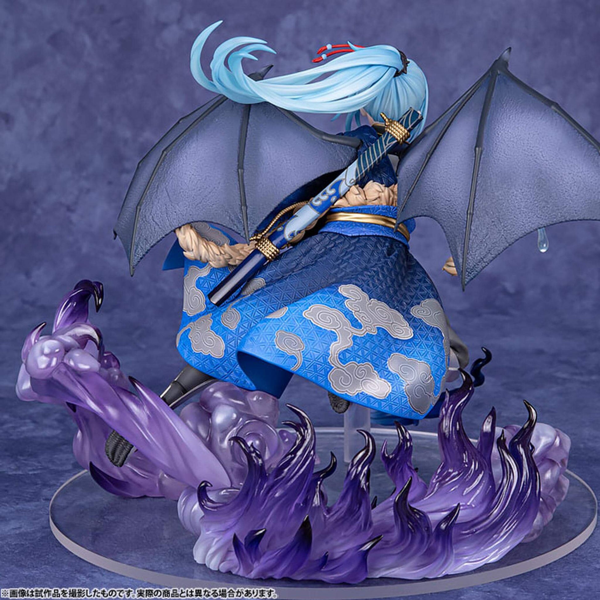 That Time I Got Reincarnated as a Slime Figurine of Rimuru Tempest  in blue attire with an umbrella and purple flames on a dark background
