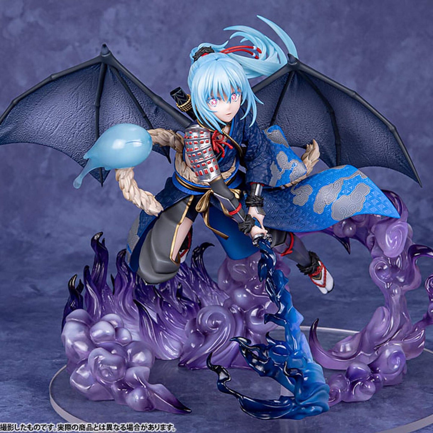 That Time I Got Reincarnated as a Slime Figurine of Rimuru Tempest  with blue hair and dragon-like wings on a purple background