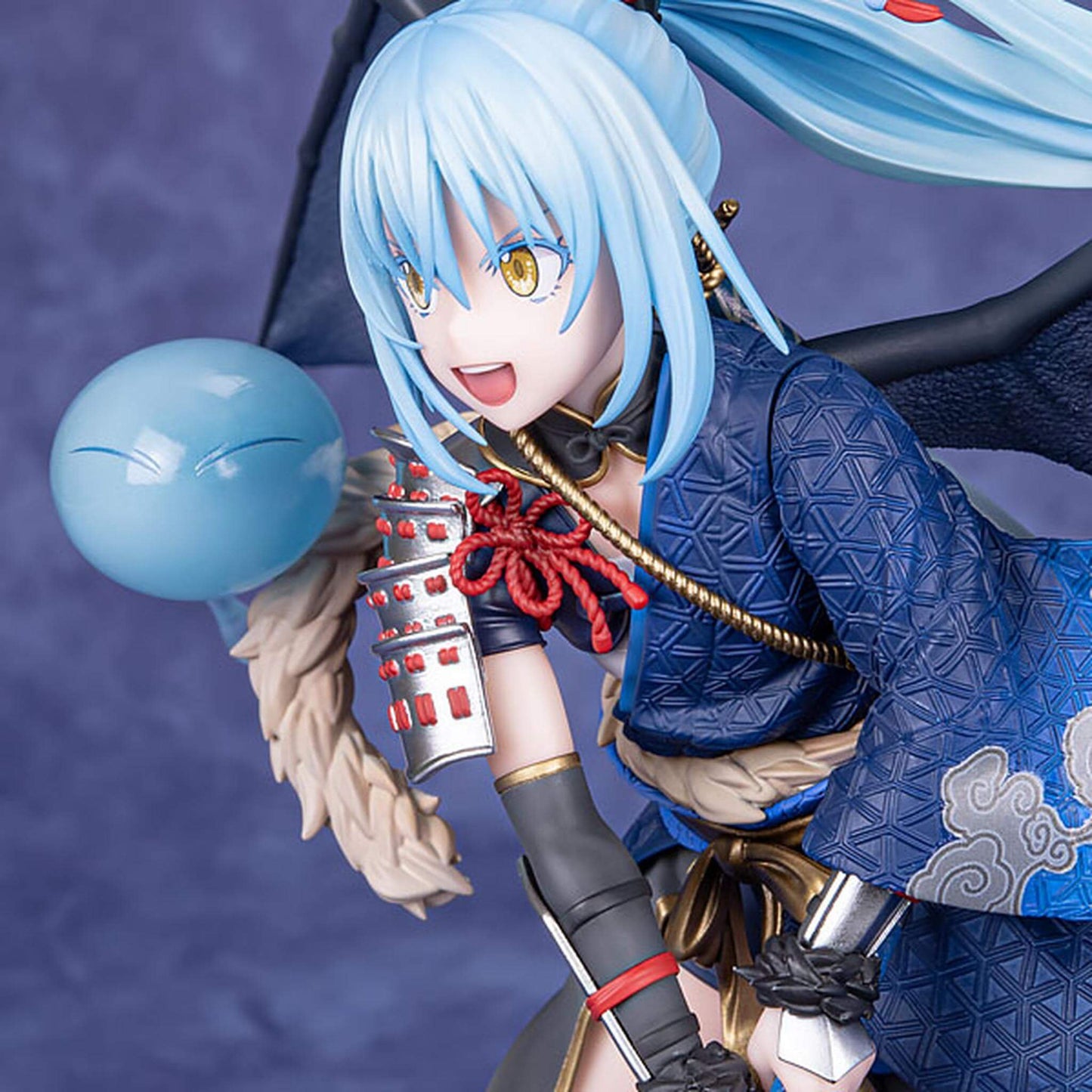 That Time I Got Reincarnated as a Slime Figurine of Rimuru Tempest  with blue hair and traditional outfit against a purple background