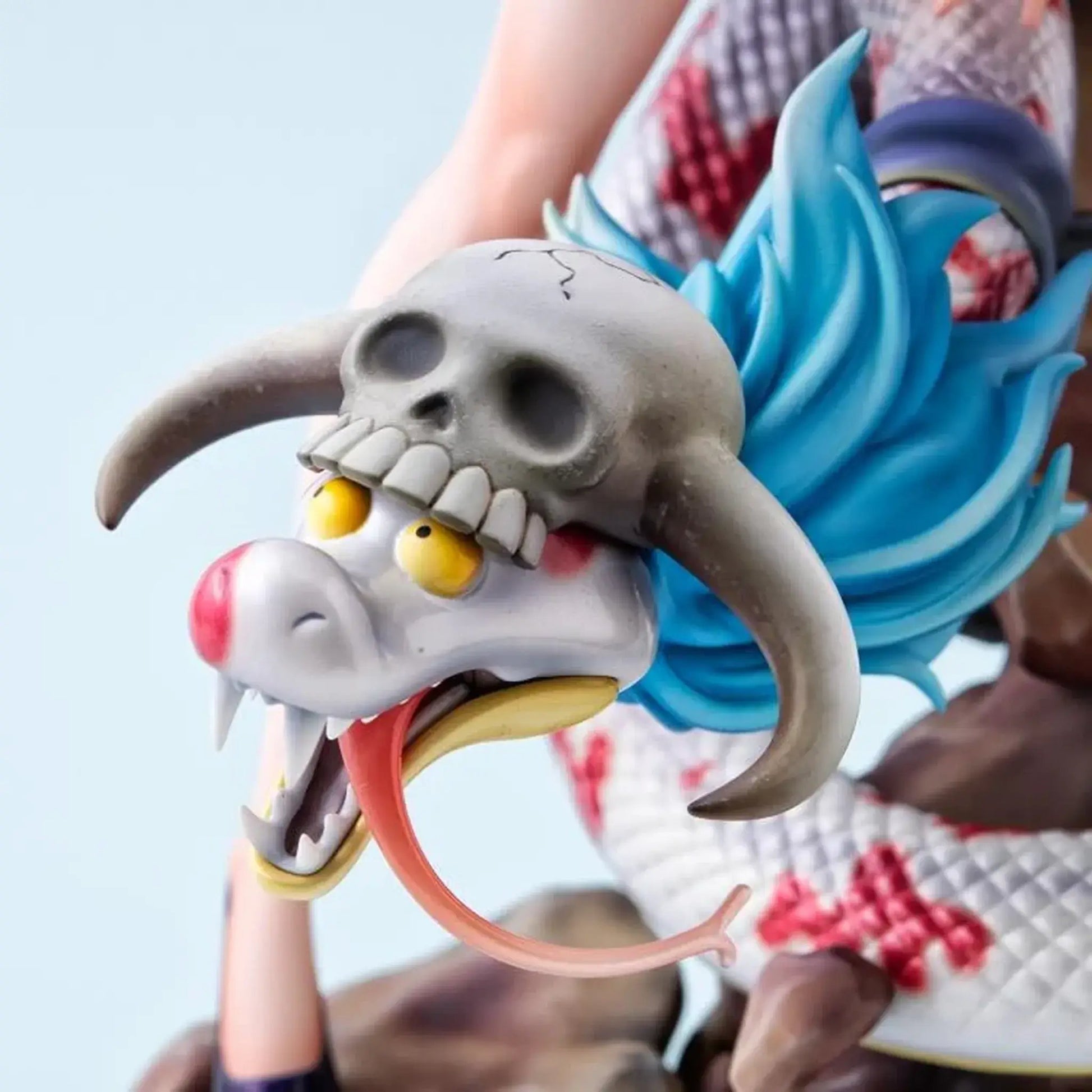 Close-up of a snake with a skull-like head and blue hair from One Piece Portrait of Pirates A-MAXIMUM Pirate Empress Boa Hancock statue