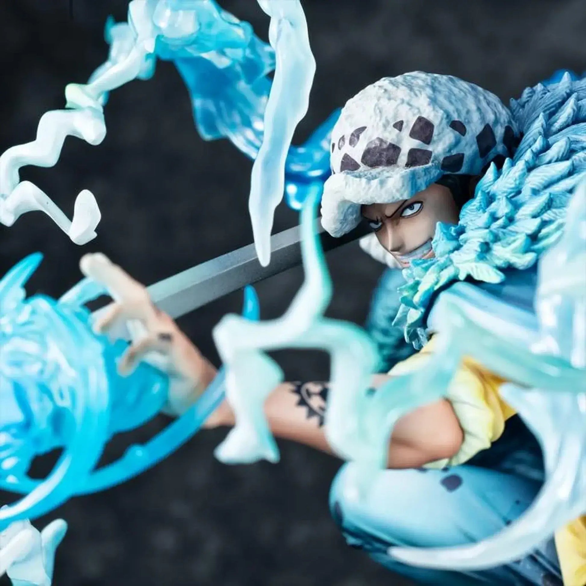 One Piece Portrait Of Pirates WA-MAXIMUM Trafalgar Law "The Surgeon of Death" (Awaken) figure with blue energy effect and helmet on a dark background