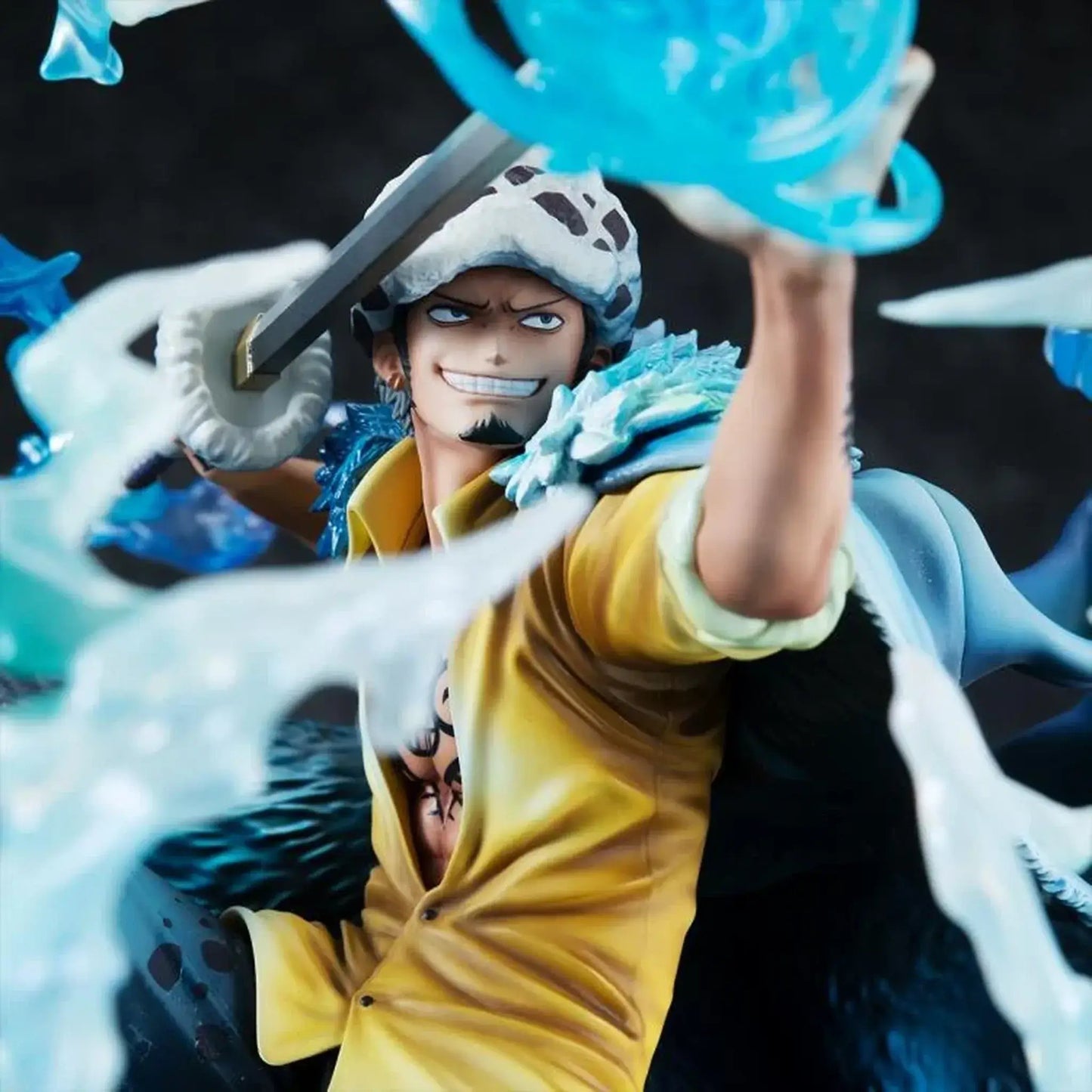 One Piece Portrait Of Pirates WA-MAXIMUM Trafalgar Law "The Surgeon of Death" (Awaken) figure of a character from an anime with dynamic pose and blue energy effect.