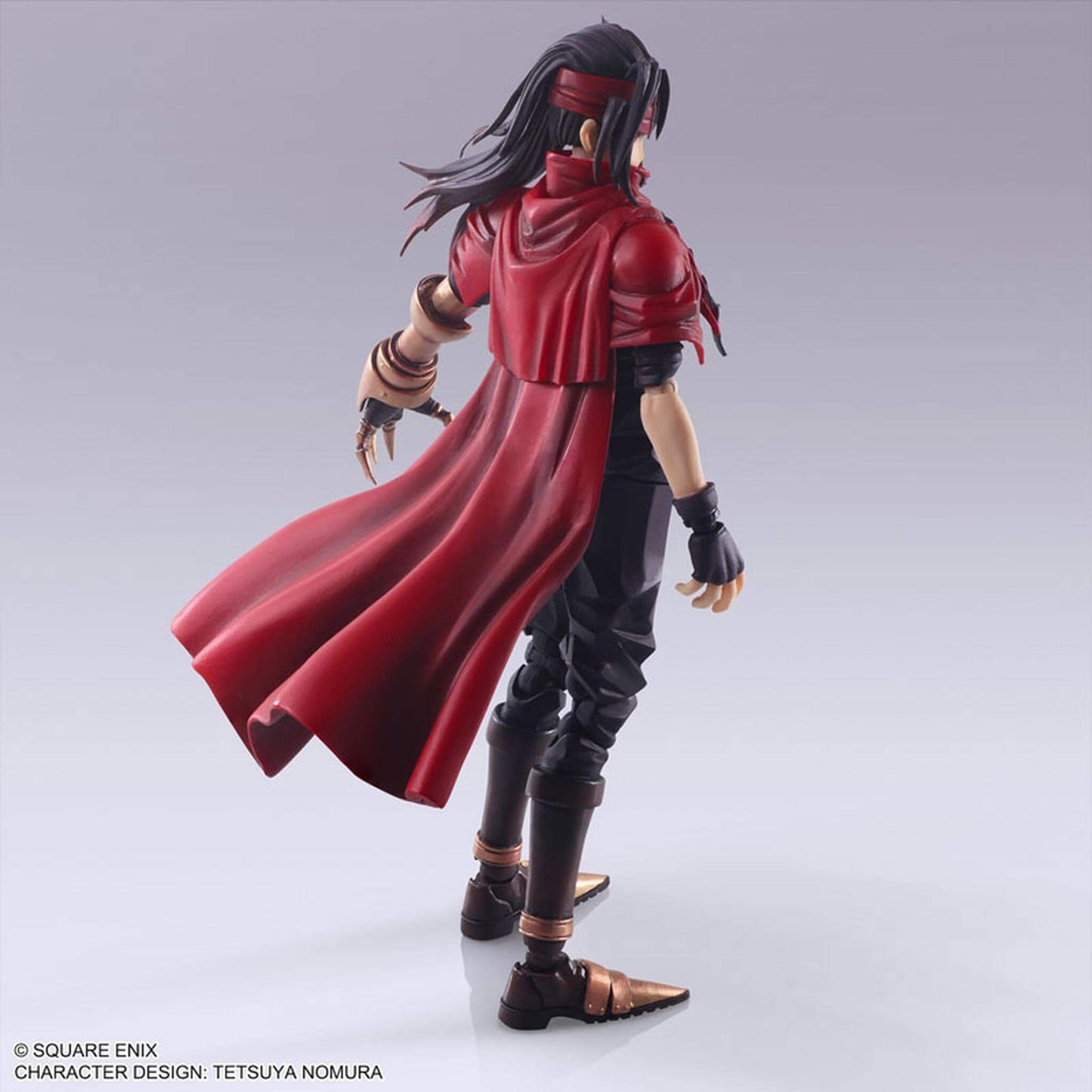 Back view of Final Fantasy 7 Vincent Valentine Action figure with a red cape and black outfit on a gray background